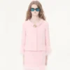 Chaqueta de crepé couture con plumas Chaqueta de crepé couture con plumas