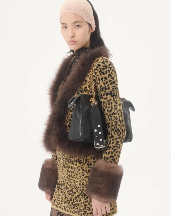 Chaqueta de punto jacquard con estampado animal y lurex Chaqueta de punto jacquard con estampado animal y lurex