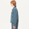 Chaqueta vaquera con bordados de abalorios y bordes estampados Chaqueta vaquera con bordados de abalorios y bordes estampados