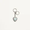 Colgante para bolso Coeur Hyperbole con llavero en metal, material sintético y cristales Colgante para bolso Coeur Hyperbole con llavero en metal, material sintético y cristales