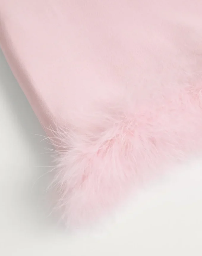 Falda corta de crepé couture con plumas