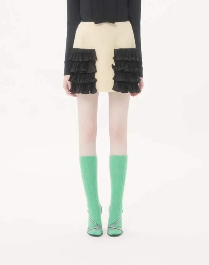 Falda corta de tweed de lana liso