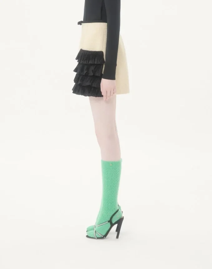 Falda corta de tweed de lana liso