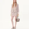Falda de tweed con cinta Falda de tweed con cinta
