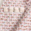 Falda de tweed con cinta Falda de tweed con cinta