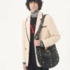 Jersey de lana de cuello alto Valentino con parche VLogo Jersey de lana de cuello alto Valentino con parche VLogo