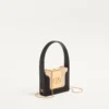 Minaudière Minaumorphe de Valentino Garavani en metal con cristales Swarovski® y estuche de satén