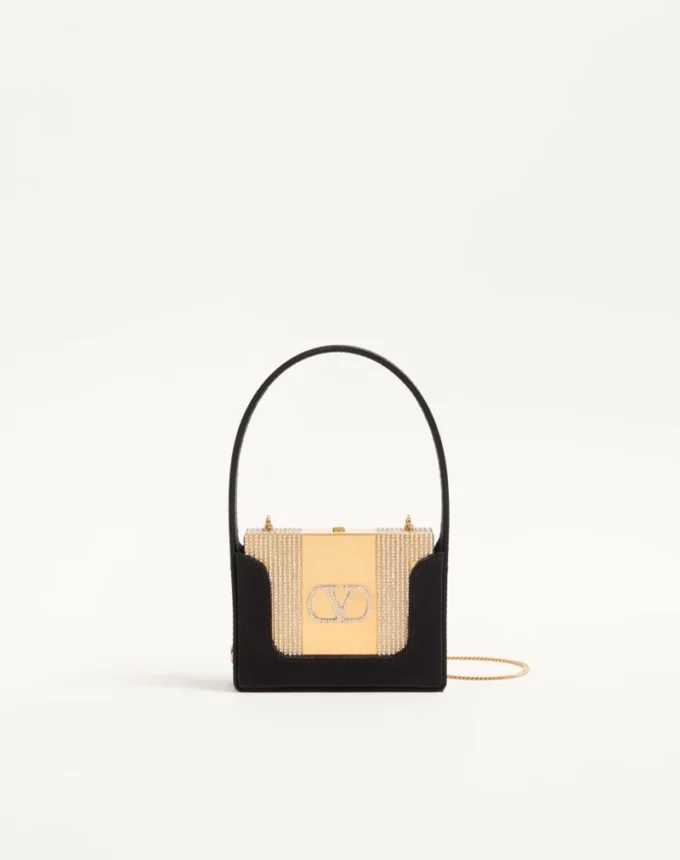 Minaudière Minaumorphe de Valentino Garavani en metal con cristales Swarovski® y estuche de satén