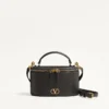Mini bolso de mano Vlogo Signature en piel de becerro granulada