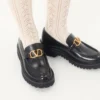 Mocasines de piel de becerro con el logotipo VLogo