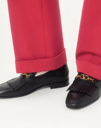 Mocasines de piel de cabrito con flecos y logotipo VLogo