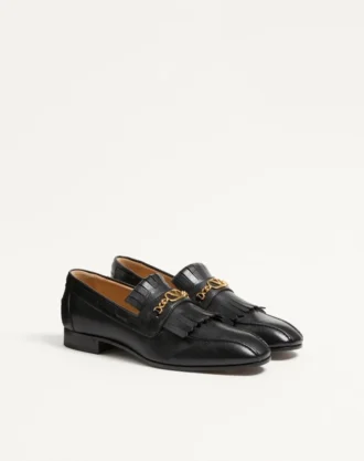 Mocasines de piel de cabrito con flecos y logotipo VLogo