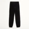 Pantalones de chenilla con parche Chez Valentino Pantalones de chenilla con parche Chez Valentino