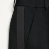 Pantalones de lana con puños y bandas laterales de satén