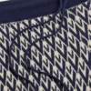 Pantalones de lana jacquard Toute La V Pantalones de lana jacquard Toute La V