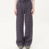 Pantalones ligeros de lino con vuelta y estampado Voyage Imaginaire