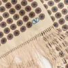 Pañuelo bandeau de seda con flecos