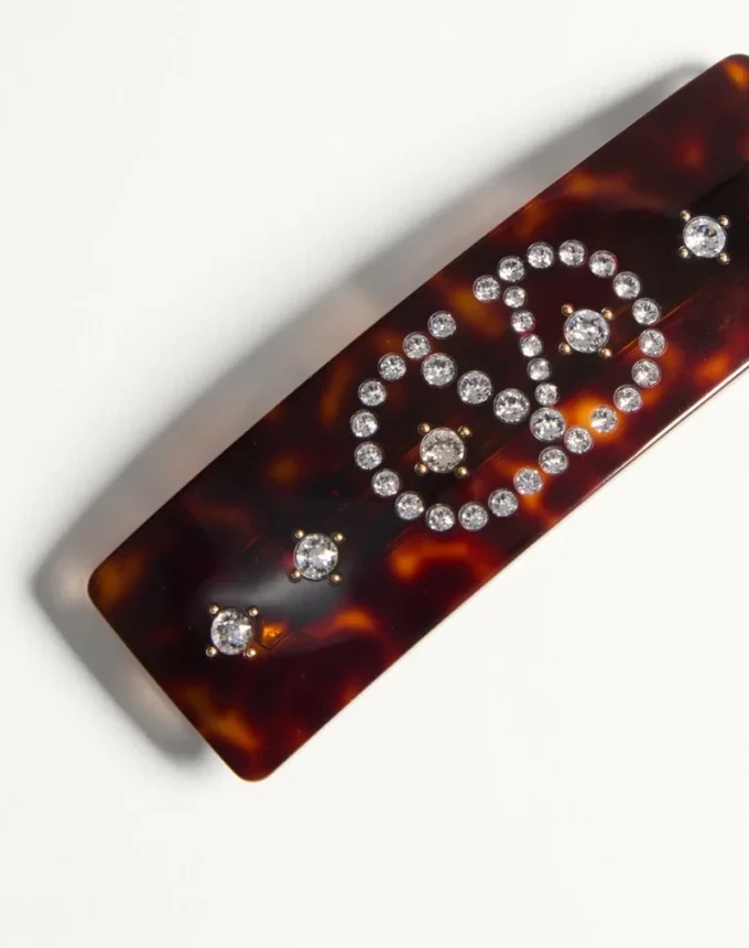 Pinza para el pelo con el logotipo Vlogo en resina, metal y cristales Pinza para el pelo con el logotipo Vlogo en resina, metal y cristales