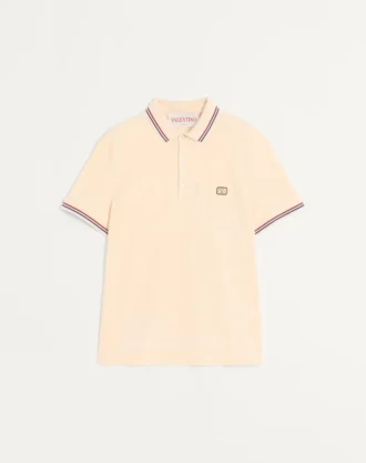 Polo de piqué de algodón con parche Vlogo
