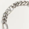 Pulsera de metal con el logotipo VLogo Pulsera de metal con el logotipo VLogo