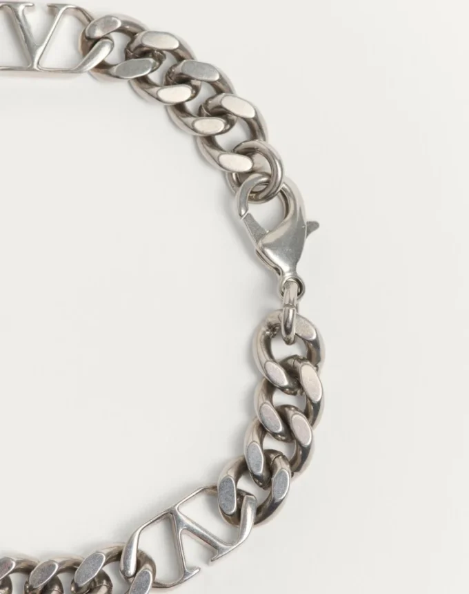 Pulsera de metal con el logotipo VLogo Pulsera de metal con el logotipo VLogo
