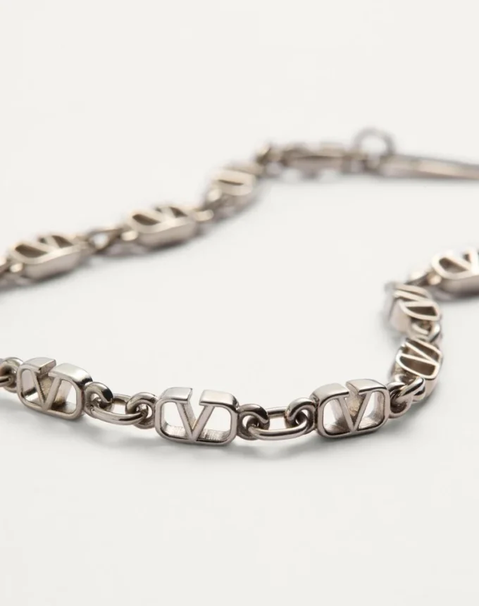 Pulsera de metal con el logotipo VLogo Pulsera de metal con el logotipo VLogo
