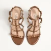 Sandalias con correa al tobillo Rockstud de piel de becerro metalizada y tacón de 90 mm