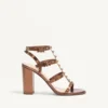 Sandalias con correa al tobillo Rockstud de piel de becerro metalizada y tacón de 90 mm