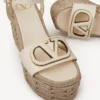 Sandalias de cuña con aberturas Vlogo en piel de becerro 110 mm Sandalias de cuña con aberturas Vlogo en piel de becerro 110 mm