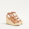 Sandalias de cuña Rockstud con tiras de piel de becerro de 95 mm Sandalias de cuña Rockstud con tiras de piel de becerro de 95 mm