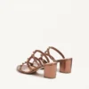 Sandalias deslizantes Rockstud de piel de becerro metalizada con tacón de 60 mm