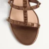Sandalias deslizantes Rockstud de piel de becerro metalizada con tacón de 60 mm