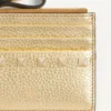 Tarjetero Rockstud de piel de becerro granulada laminada con cremallera Tarjetero Rockstud de piel de becerro granulada laminada con cremallera