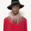 Top de georgette con plumas Top de georgette con plumas