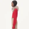 Top de georgette con plumas Top de georgette con plumas