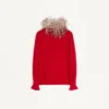 Top de georgette con plumas Top de georgette con plumas