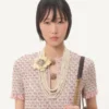 Vestido corto de tweed con cinta bordada