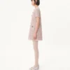 Vestido corto de tweed con cinta bordada