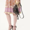 Vestido de georgette lurex con estampado Voyage Imaginaire Vestido de georgette lurex con estampado Voyage Imaginaire