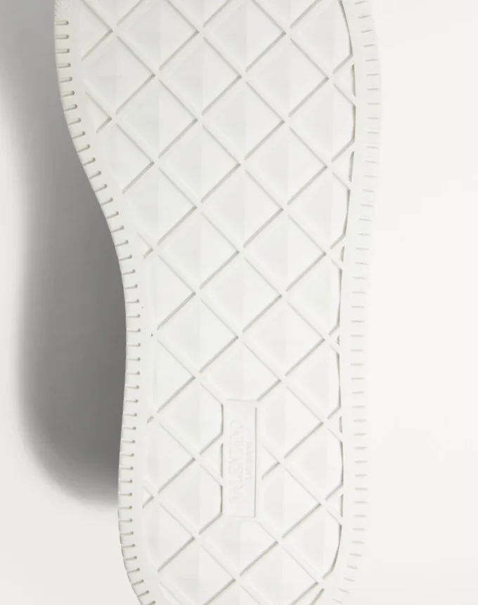Zapatillas bajas de napa con un tachón Zapatillas bajas de napa con un tachón