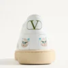 Zapatillas Royco de piel de becerro napa con motivo Le Chat De La Maison Zapatillas Royco de piel de becerro napa con motivo Le Chat De La Maison