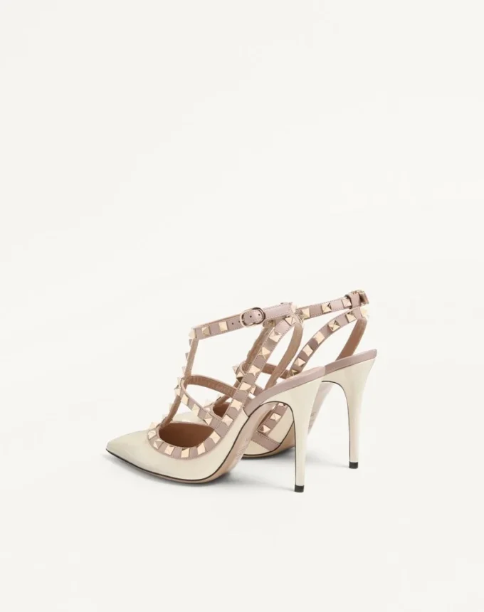 Zapatos de salón con tacón de 100 mm y adornos Rockstud en charol Zapatos de salón con tacón de 100 mm y adornos Rockstud en charol