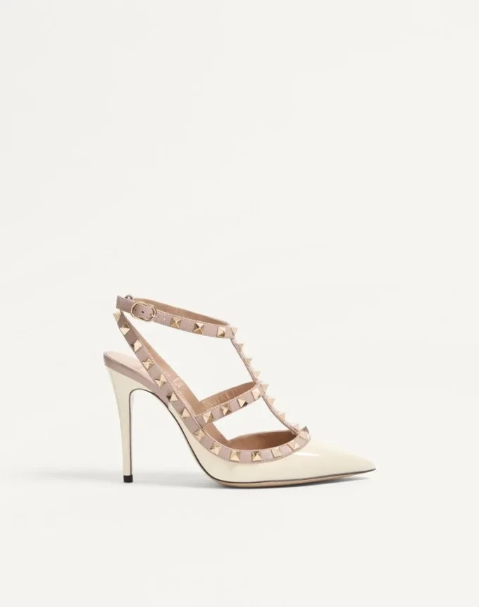 Zapatos de salón con tacón de 100 mm y adornos Rockstud en charol Zapatos de salón con tacón de 100 mm y adornos Rockstud en charol