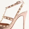 Zapatos de salón Rockstud en piel napa laminada 100 mm